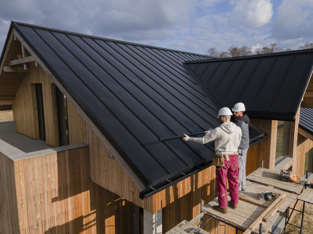 full-shot-roofers-working-together-with-helmets.jpg